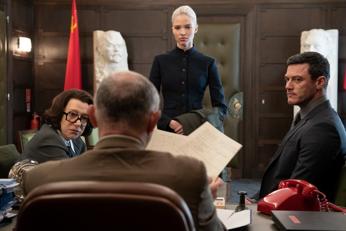 Luke Evans in a meeting with Soviet officials