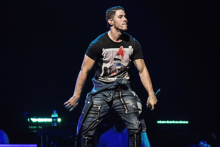 Nick Jonas performing on stage