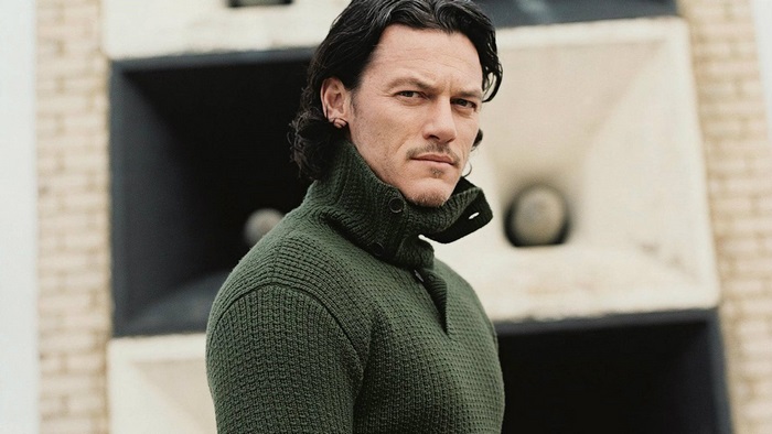 Luke Evans in green sweater