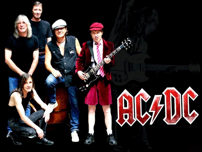 AC/DC band members with Angus Young