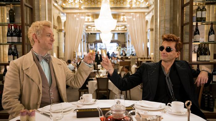 David Tennant and Michael Sheen in a restaurant
