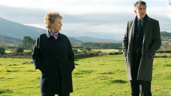Judi Dench and Steve Coogan in a field