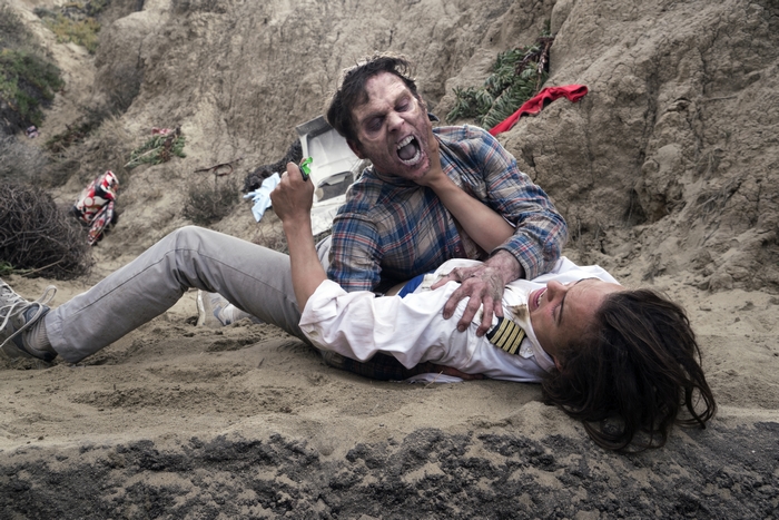Nick Clark fighting a zombie