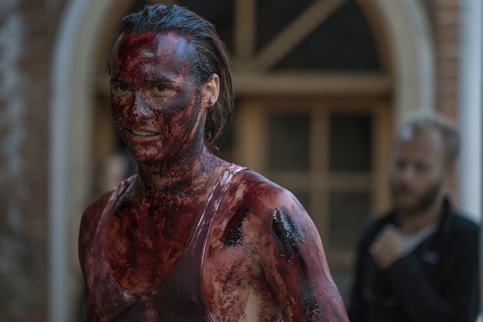 Nick Clark covered in blood