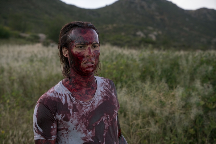 Nick Clark covered in blood