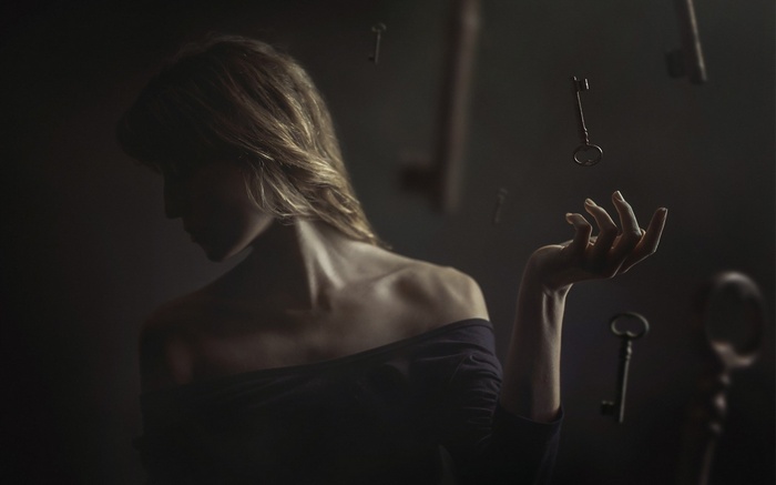 Woman with floating keys