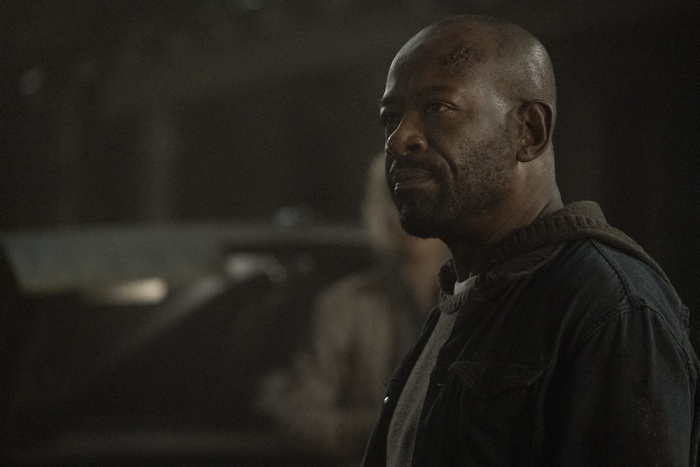 Lennie James in a dark setting