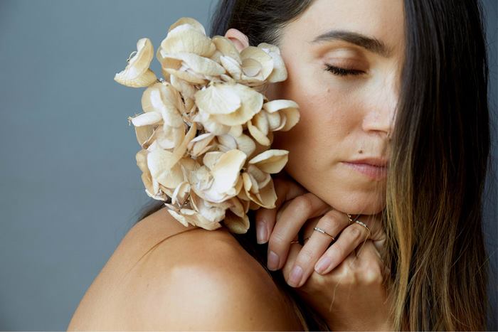 Nikki Reed with dried flowers