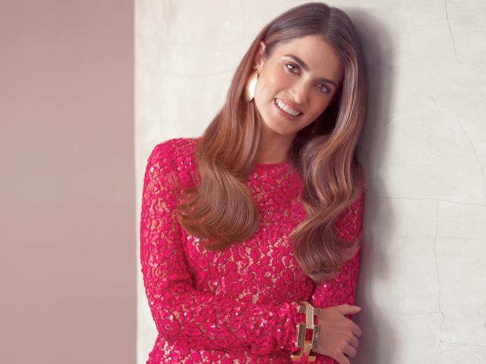 Nikki Reed in a pink lace dress