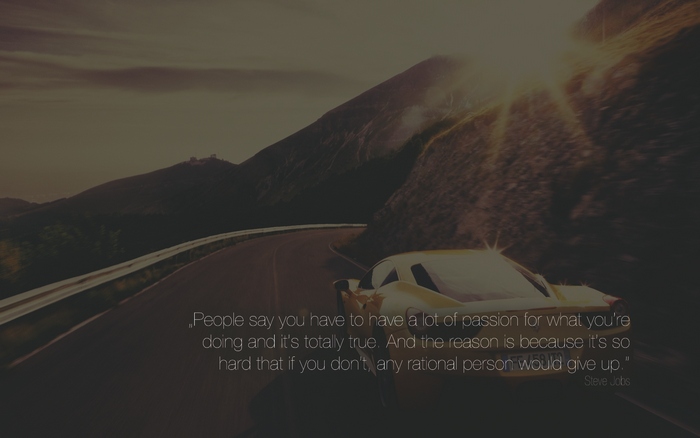 Steve Jobs quote on a winding road with a sports car