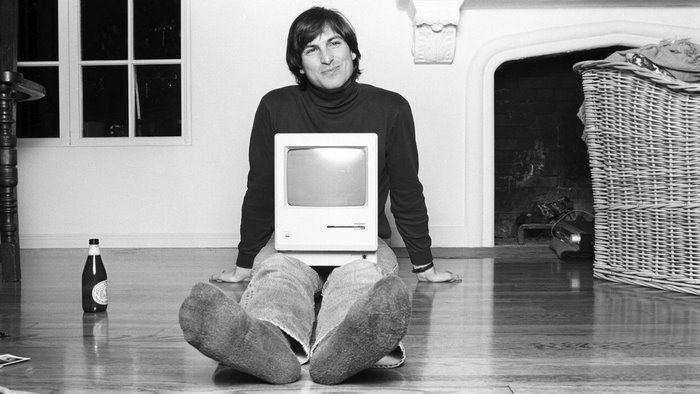 Steve Jobs with Apple Macintosh computer