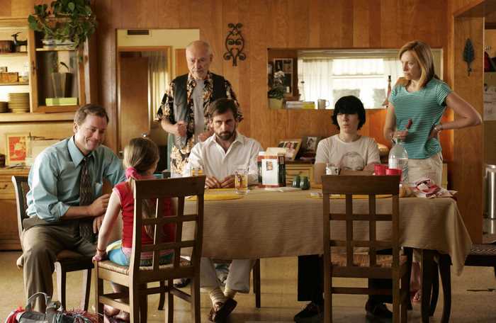 Family gathered around a dining table