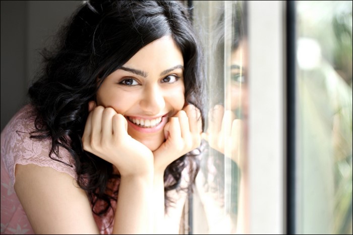 Adah Sharma smiling by the window