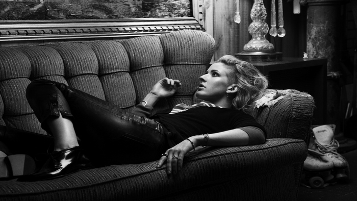 Ellie Goulding on a couch