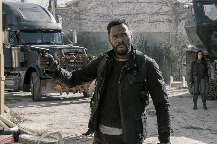 Colman Domingo holding a gun
