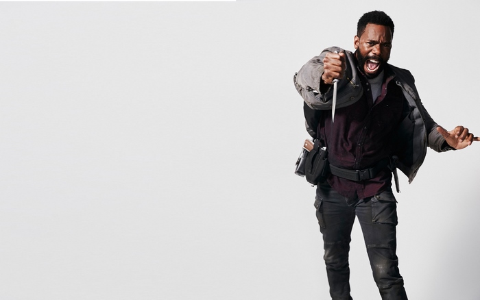 Colman Domingo holding a knife