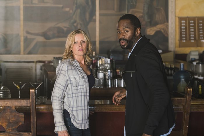 Colman Domingo and Kim Dickens in a bar