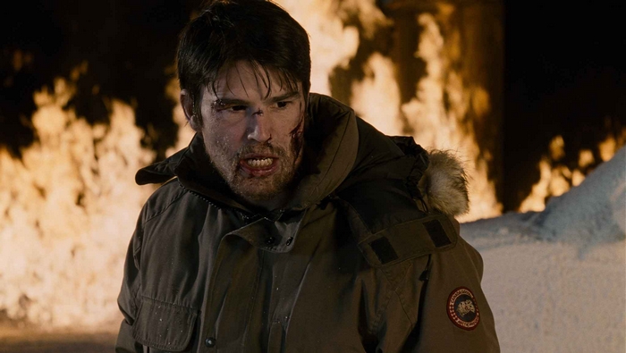 Josh Hartnett in front of fire