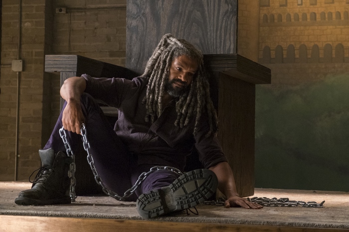 Khary Payton chained to a throne