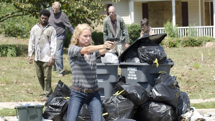 Andrea from The Walking Dead aiming a gun