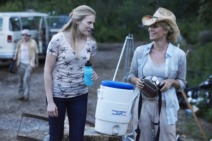Laurie Holden with a cooler and water bottle