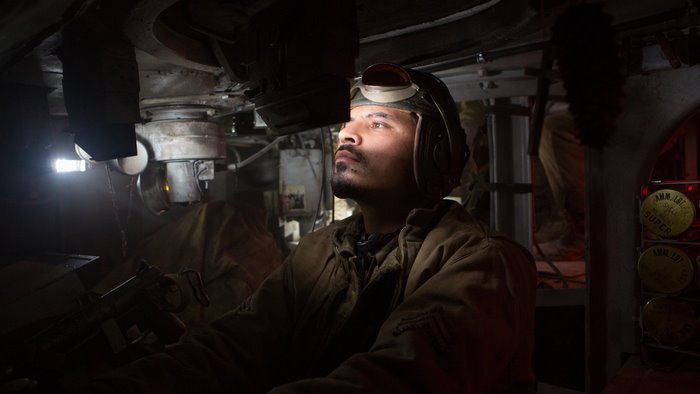 Michael Peña in a tank