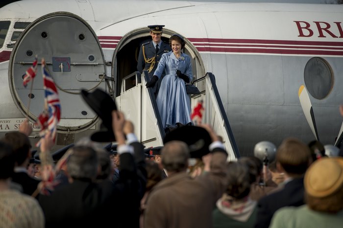 Queen Elizabeth II disembarking from a British airplane