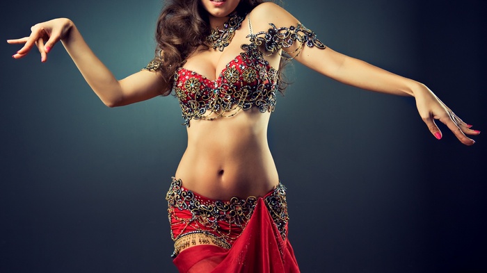 Woman in a red belly dancing costume