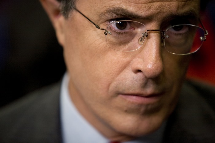 Stephen Colbert wearing glasses