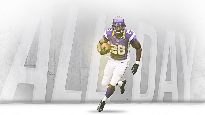 Adrian Peterson running with football