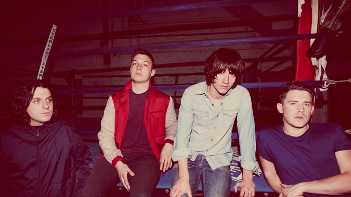 Arctic Monkeys in a boxing ring