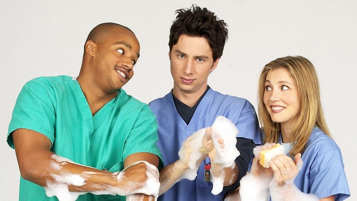 Donald Faison and two actors washing hands