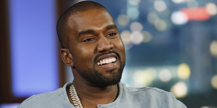 Kanye West wearing a necklace