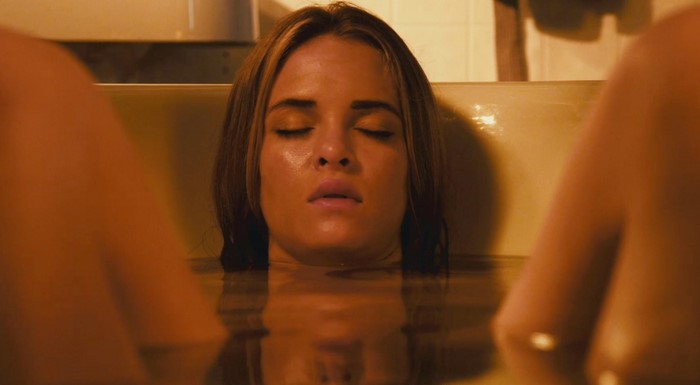 Danielle Panabaker in a bathtub