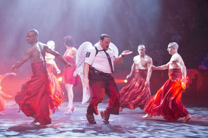 Kevin James with dancers on stage