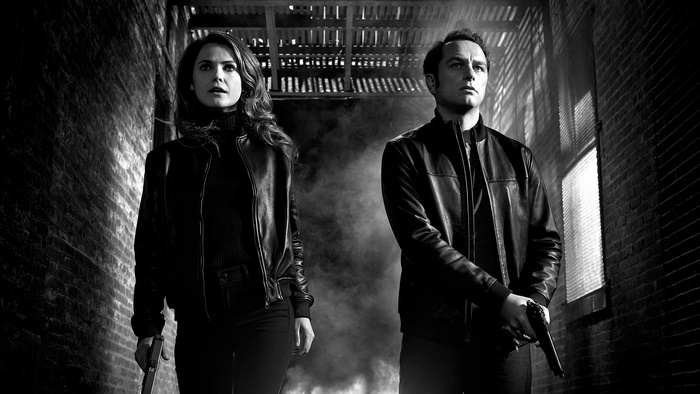 Keri Russell and man with guns in alley