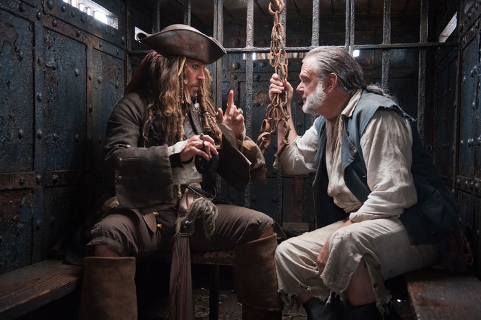 Jack Sparrow and Gibbs in a prison cell