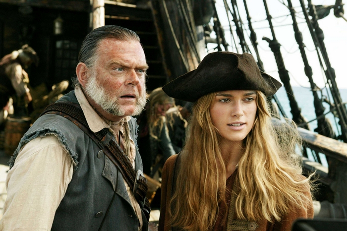 Kevin McNally and Keira Knightley on a ship