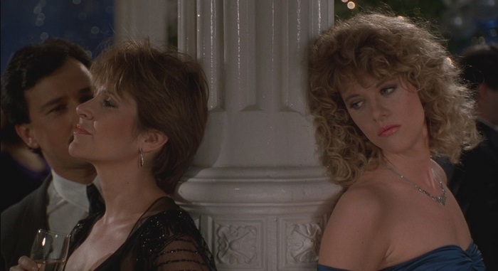 Meg Ryan in a blue dress at a party