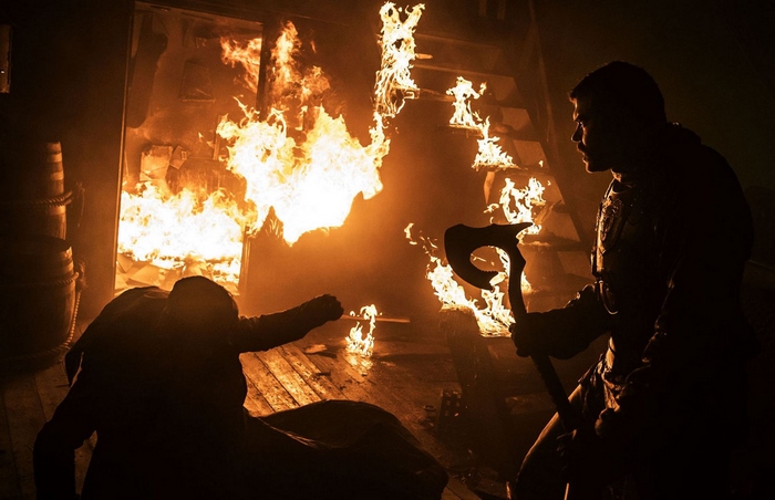Pilou Asbæk in a burning ship