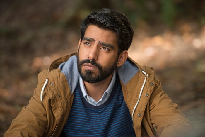 Rahul Kohli in a brown jacket