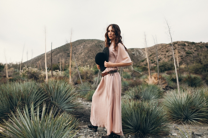Troian Bellisario in a desert landscape