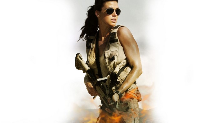 Adrianne Palicki as a soldier with a rifle