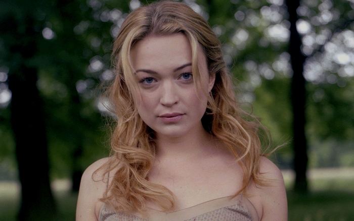 Sophia Myles in a park
