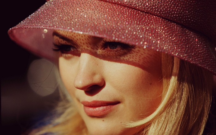 Sophia Myles wearing a pink sparkly hat