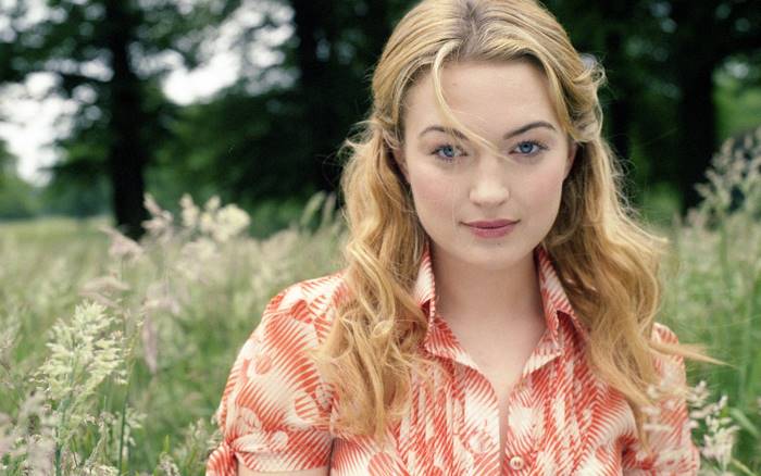 Sophia Myles in a field
