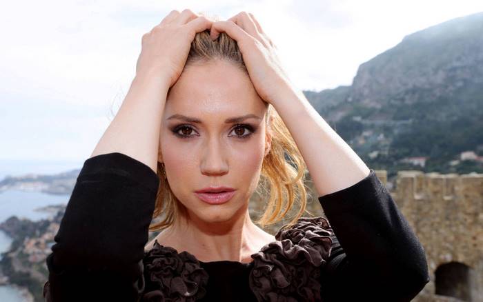 Ashley Jones with hands in hair