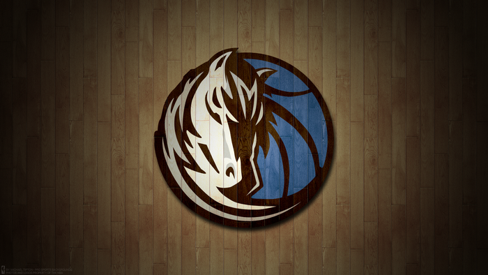 Dallas Mavericks logo on wooden background