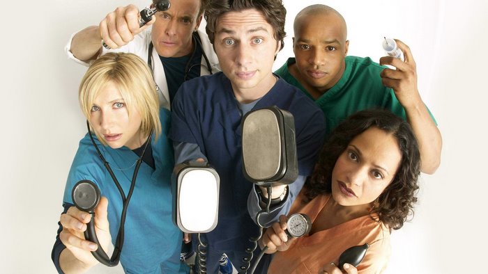Scrubs cast with medical equipment
