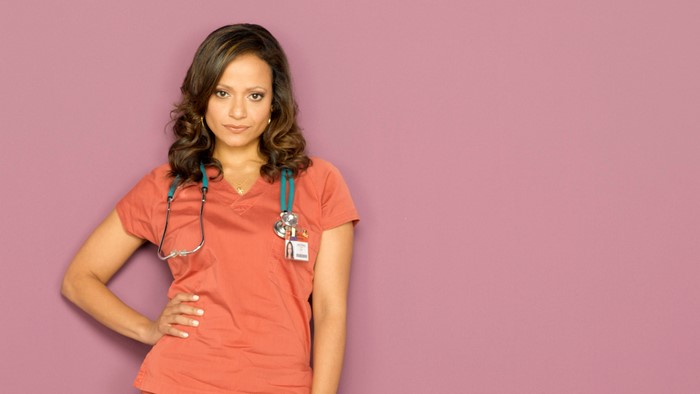 Judy Reyes as a nurse with stethoscope